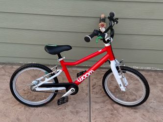 Woom 3 go with 2 speed automagic rear hub its a 16 inch great shape and light weight