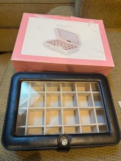 Mele & Co. jewelry organizer 24 compartments w/a clear glass top and snap closure