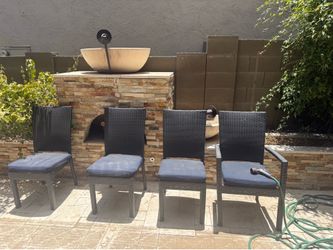 6 sumbrella cushioned chairs