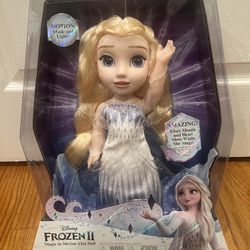 Brand new Disney frozen magic in motion Elsa doll