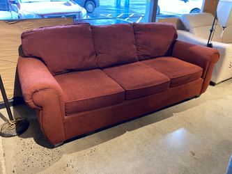 Brick Red Three Cushion Sofa with Rolled Arms