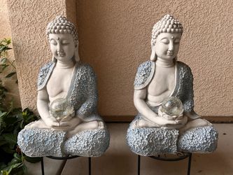 Buddha solar statue