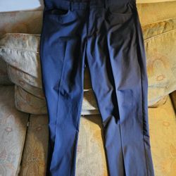 A pair of greg norman strait front black slacks in great condition size 36 X 30