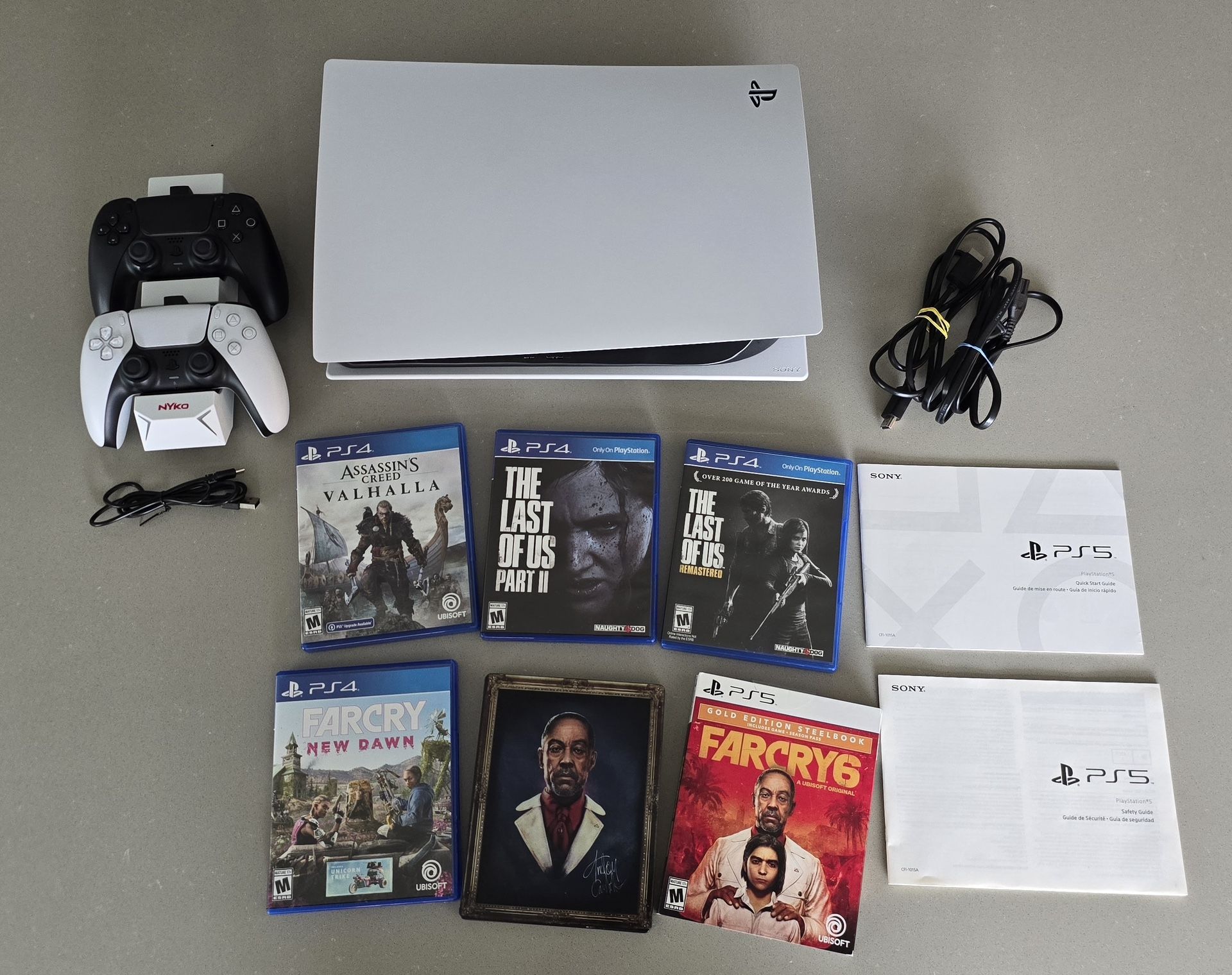 Like New PS5 With Extra Controller, Games, And Wireless Charging Dock