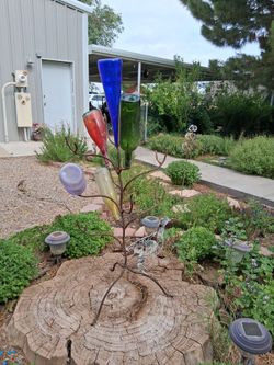 Metal bottle holder outdoor art