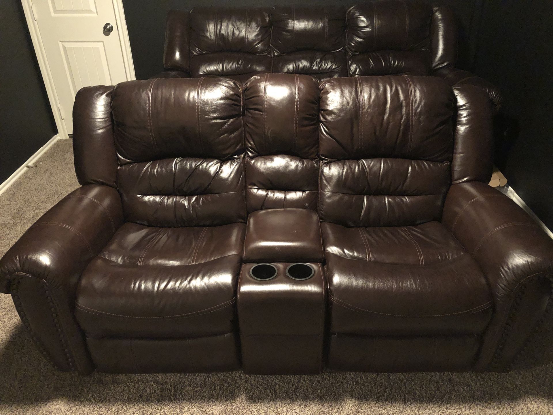 Reclining sofa and love seat with cup holders and storage