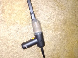 Cordless handheld vacuum and blower with charger