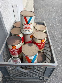 Vintage shell Rotella oil cans.