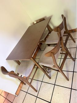 Dinner table with chairs