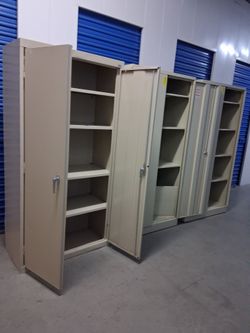 2 doors metal storage cabinet $ 230 each
