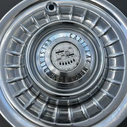 1(contact info removed) Cadillac Hubcaps