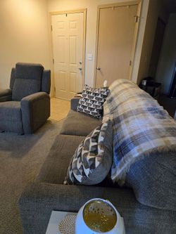 Fred Meyers sofa and recliner, both brown