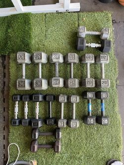 25lbs and 15lbs dumbbells left