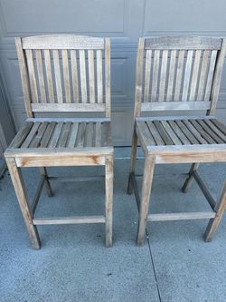 Two Teak barstools
