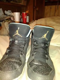 Black and grey Jordans 8.5