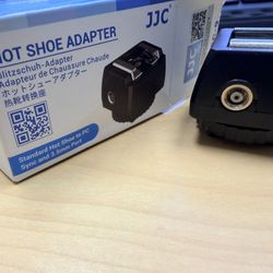 JJC Standard Hot Shoe Adapter with Extra PC sync Connection Port & 3.5mm Mini Phone Connection Port for Connecting Cameras to Additional Off-Camera Fl