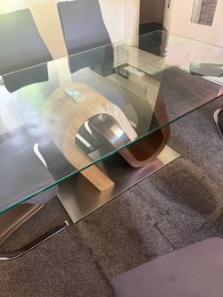 Six seater dining table and chairs