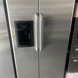 G.E 2 Doors Stainless steel refrigerator working perfect with warranty delivery and installation available 