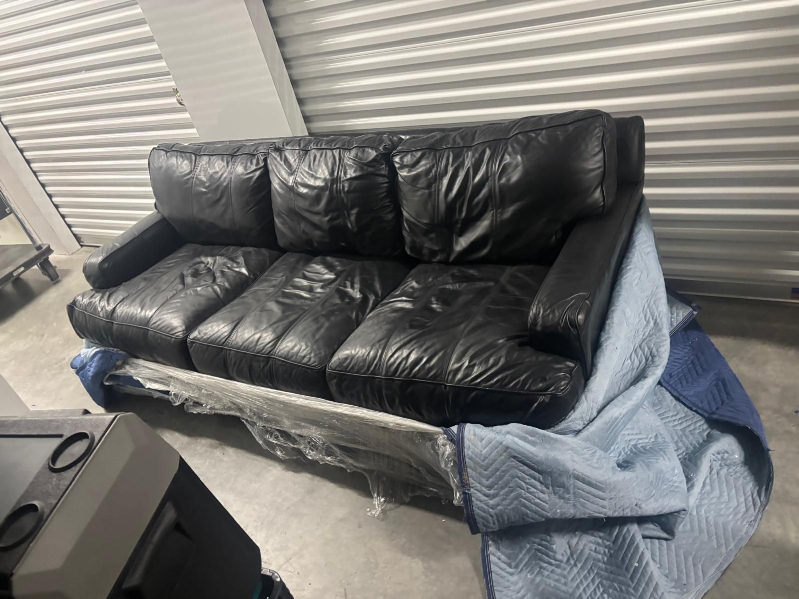 Genuine soft leather black sofa -very comfortable . 7 feet long $495