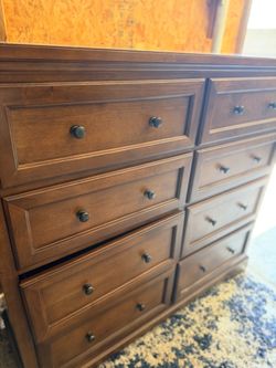 The rustic brown Ashley Furniture Porter Dresser  8 Drawers