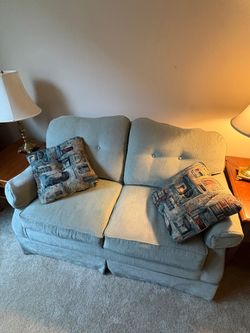 Muted Light Blue-Green Upholstered Two-Seater Sofa with Skirted Base