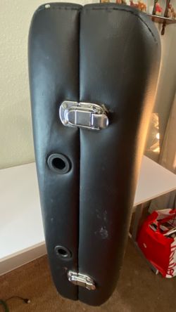 portable folding massage table (also called a portable therapy table, spa table, or tattoo table).