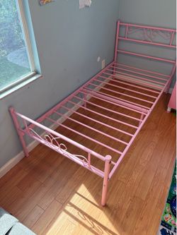 Girl’s pink bed frame