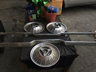 1964 thunderbird bumper and caps and couple other goodies