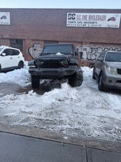 2013 Jeep Wrangler Unlimited Sahara – Lifted – 120k Miles – MD Inspected – Rebuilt Title