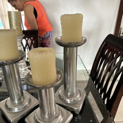 Candles Holding Silver