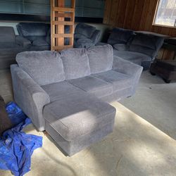 Grey L Shaped Sectional With Reversible Ottoman “WE DELIVER”