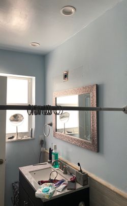 Shower curtain rod with rings