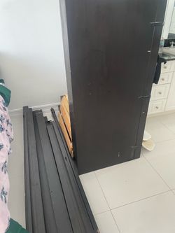 Chinese dark wood bed, no mattress