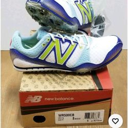 NIB New Balance Women's Cleats. Sice 7.