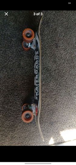 Complete Skateboard with Orange Wheels