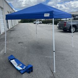 Blue 10’x10’ Pop Up Shade Canopy Travel Shelter Tent with Roll Bag and Ground Stakes! Excellent condition!