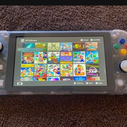 NINTENDO SWITCH LITE + 125 SWITCH GAMES and 7000 RETRO GAMES