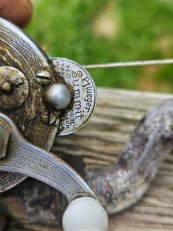 Very old fishing pole and real