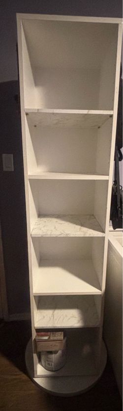 Rotating shelf with mirror