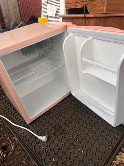 Pink mini fridge