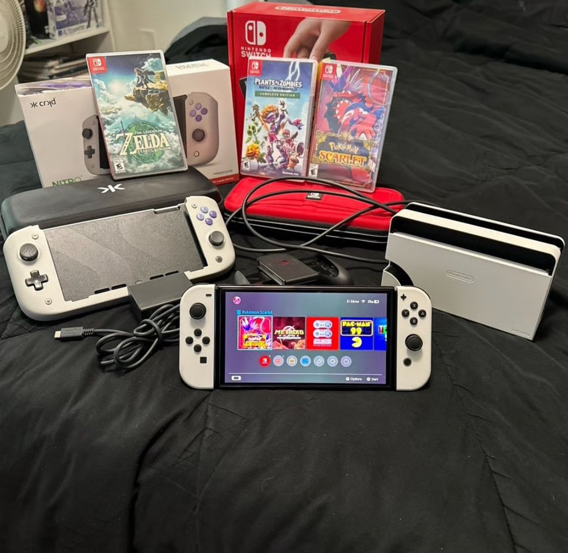 Switch OLED bundle with Accesories, Games, and Cases