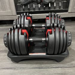 Adjustable weights (5–52.5 lbs), practically new and unused
