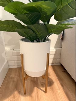 Fake plant with planter and stand