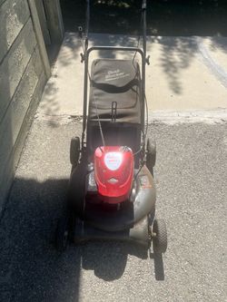 slightly used more lawnmower