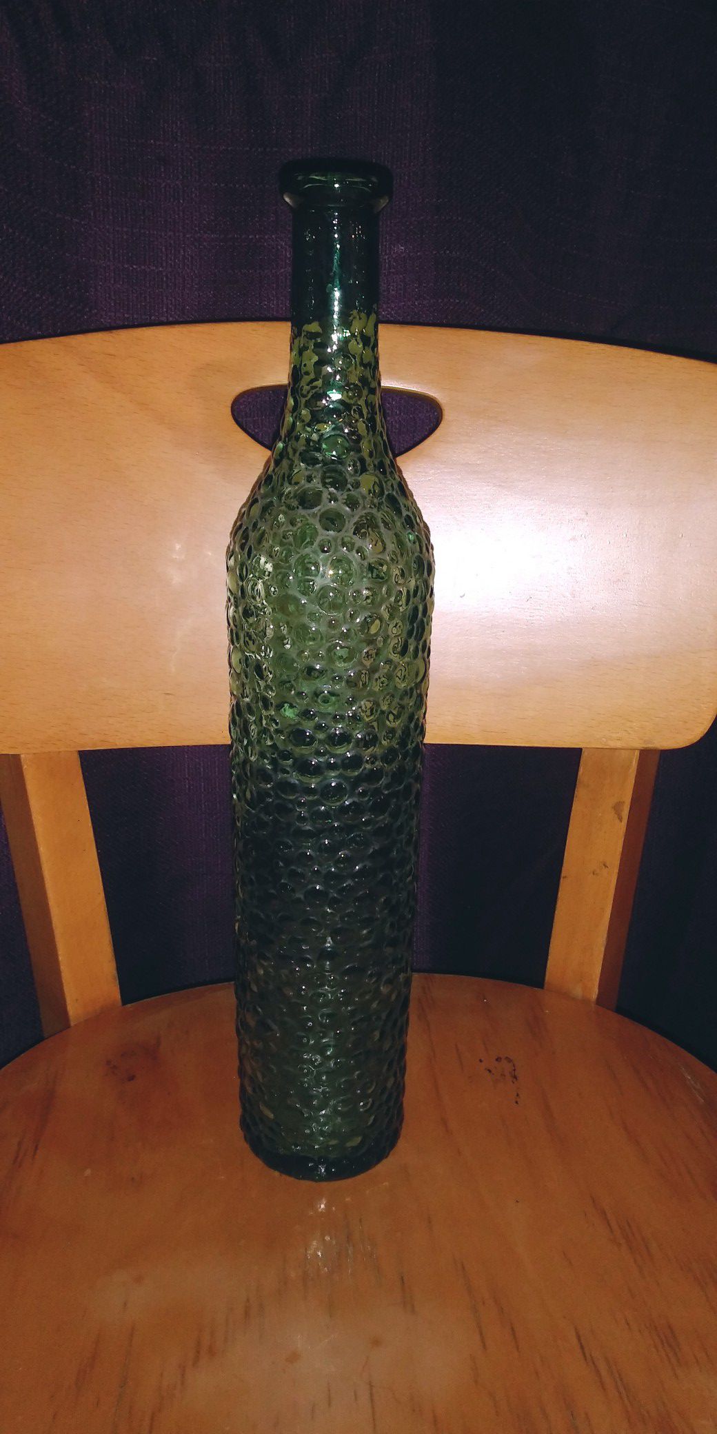 Antique green empoli wine bottle