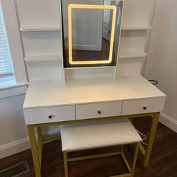 Vanity with 3 Light Settings And Outlet + Chair