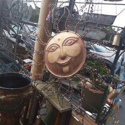 Metal Embellished Sun Face Wind Chime Wall Art