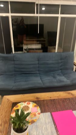 Like new blue sofa futon
