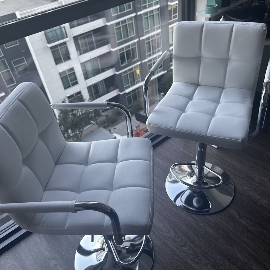 Brand New White Leather Swivel Chairs 