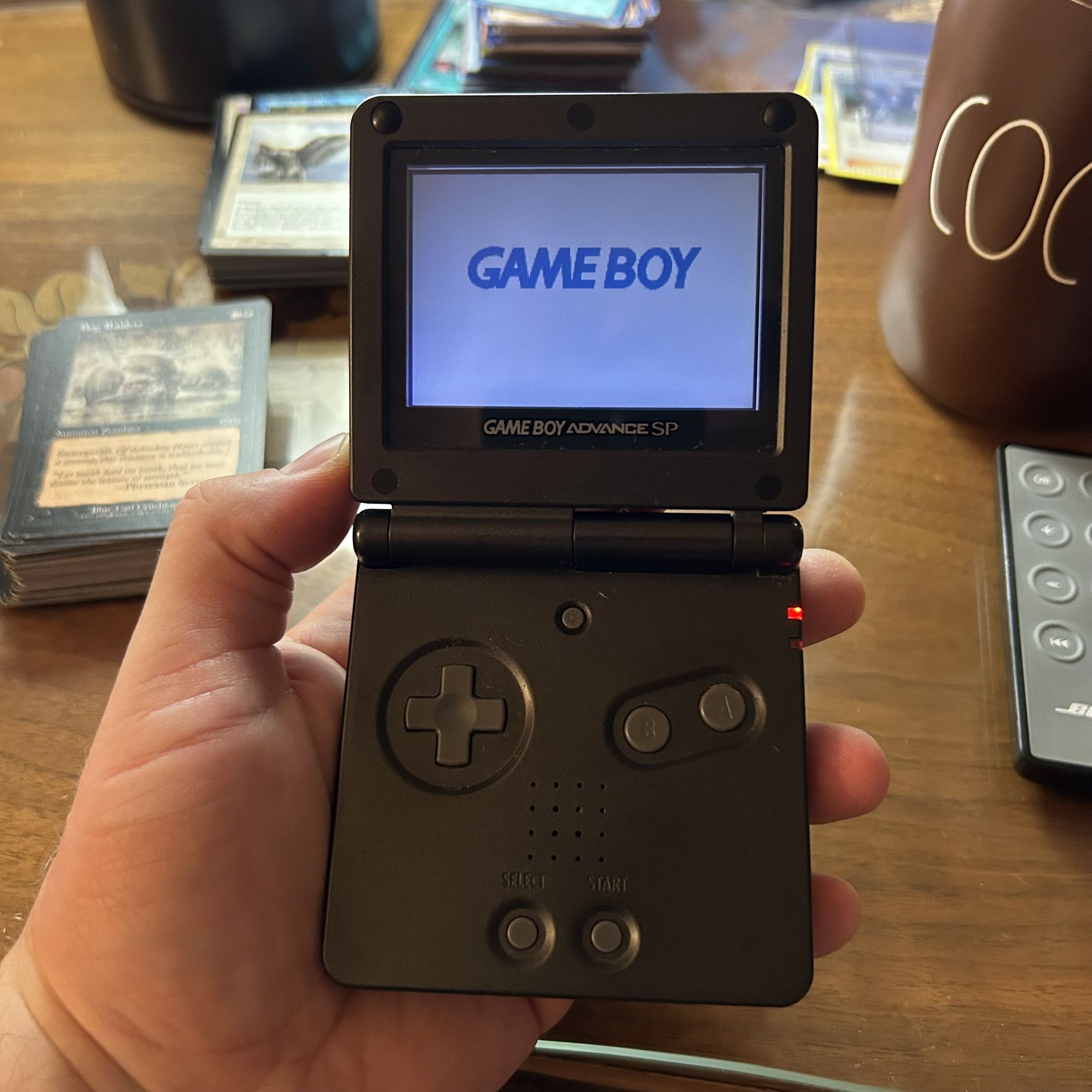 Nintendo 2002 Game Boy Advance SP Handheld Graphite with Games bomber man rampage, Lord rings, hobbit, Teenage Mutant Ninja Turtles